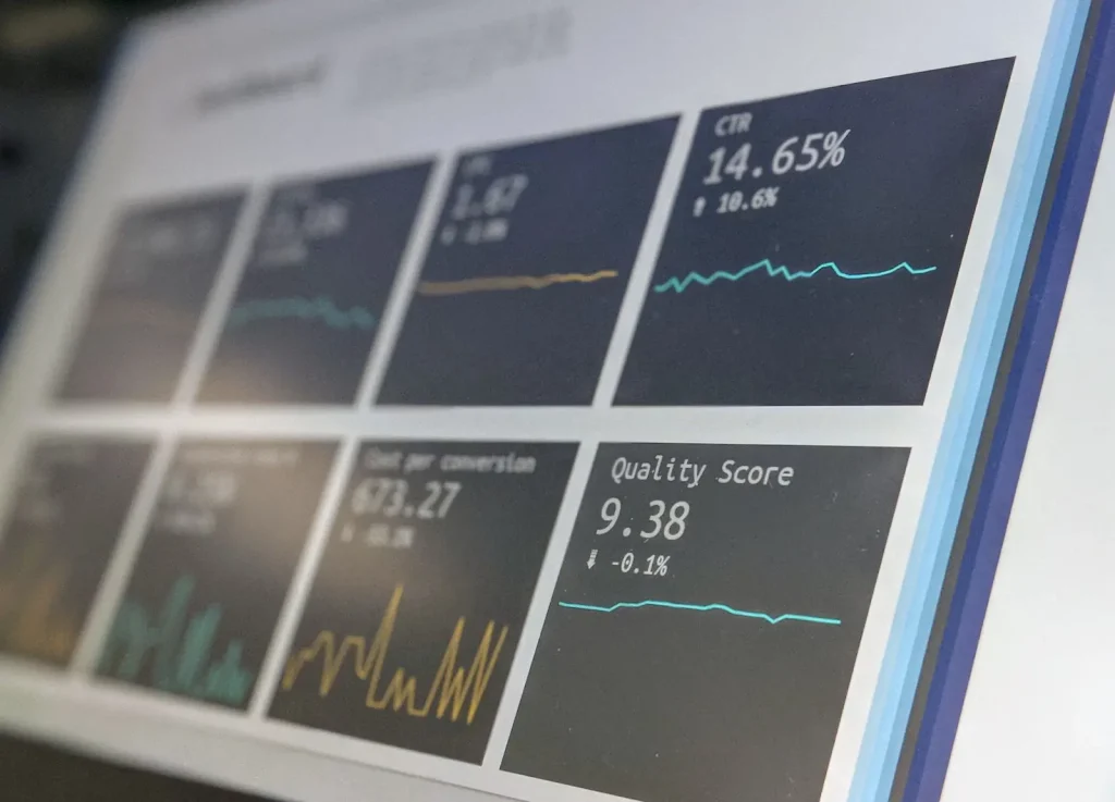 Digital metrics and analytics dashboard on screen.