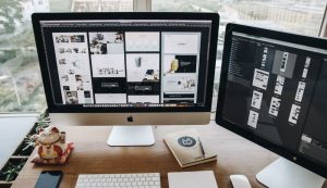 Dual monitors on a designer's workspace