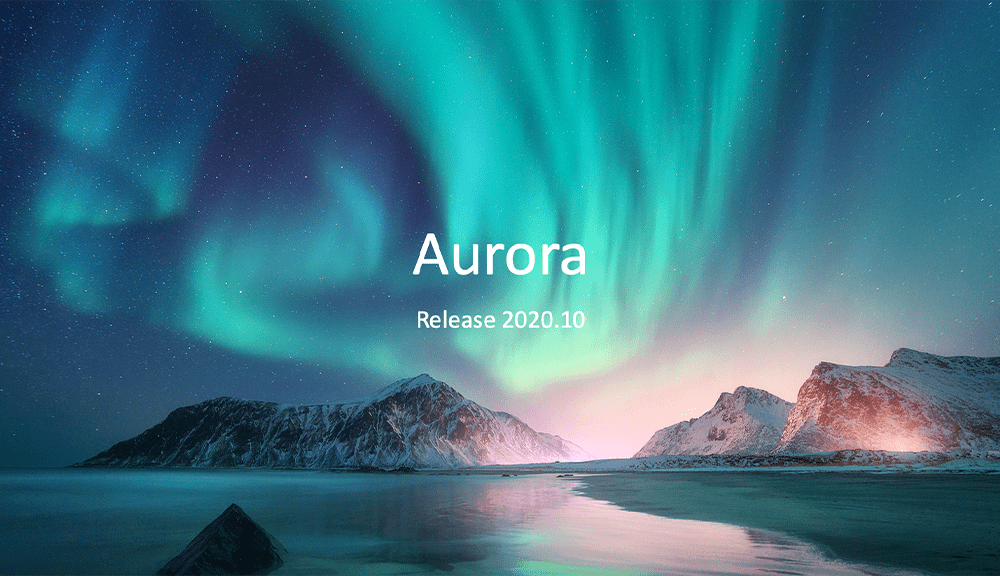 Aurora borealis over snowy mountains at night.