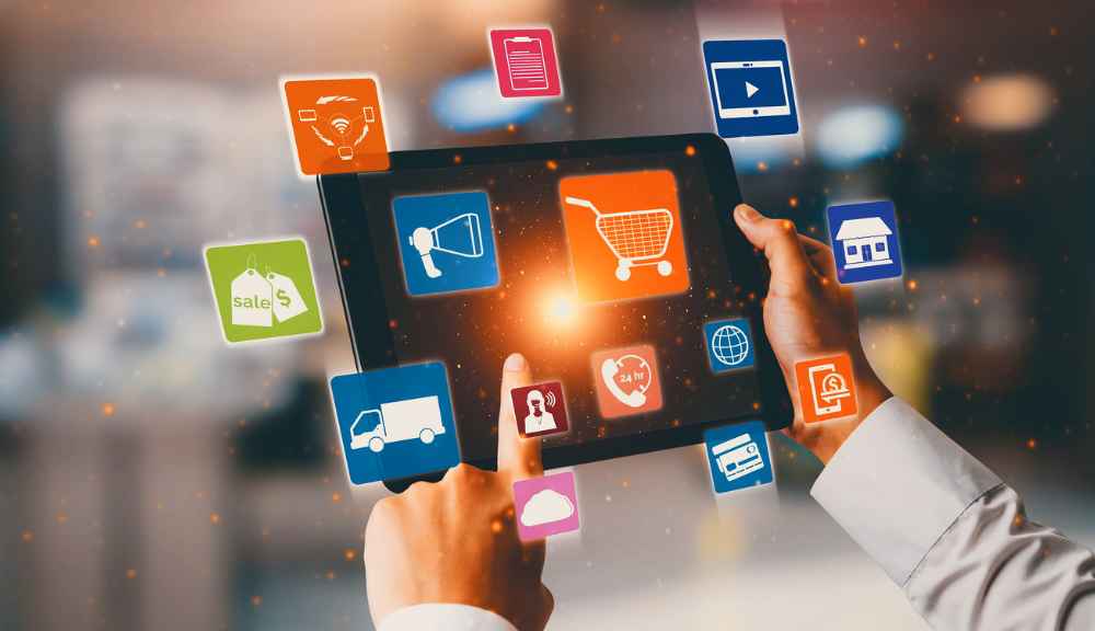 Person using tablet with shopping icons.