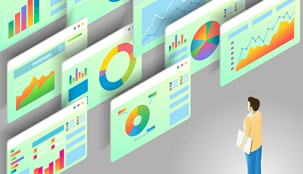 Person analyzing multiple colorful data charts on screens.