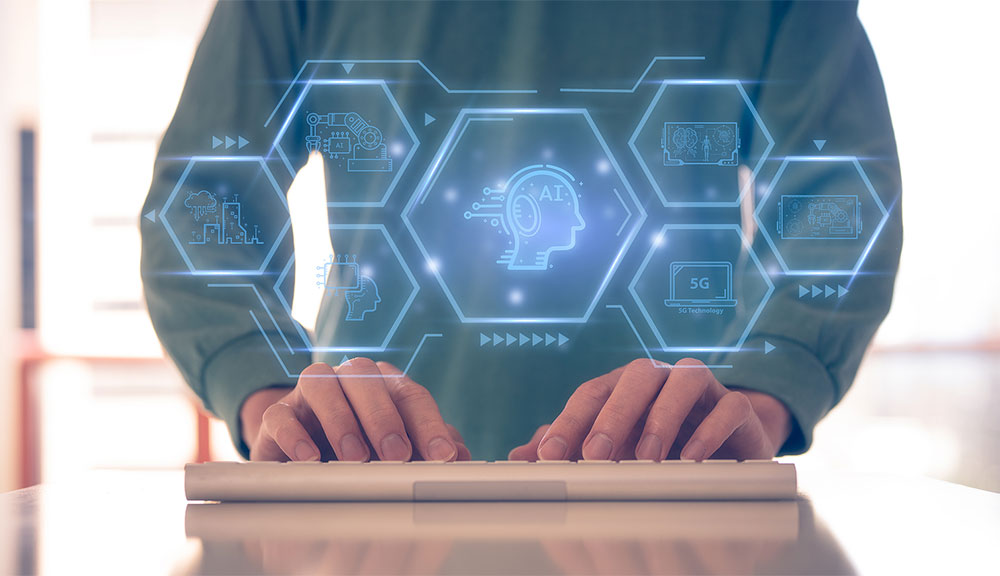 Person typing with futuristic digital interface graphics.