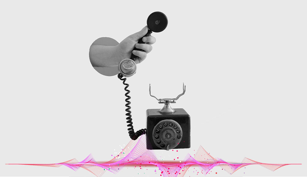 Vintage telephone with colorful sound waves