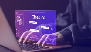 Hands typing on laptop with Chat AI interface