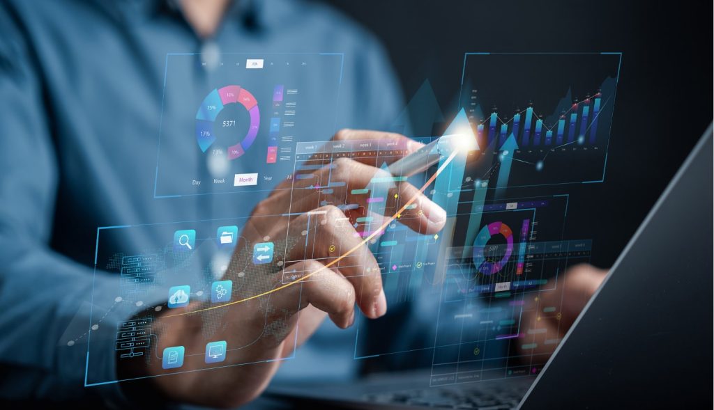 Person analyzing digital financial data on screen