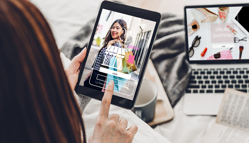 Woman using tablet for online shopping