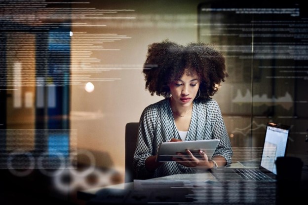 Female programmer configure SSO using laptop and tablet