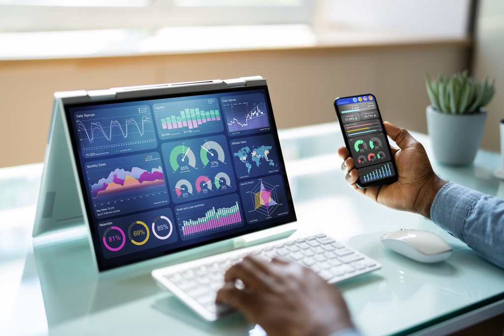 data analyst using data analytics kpi dashboard