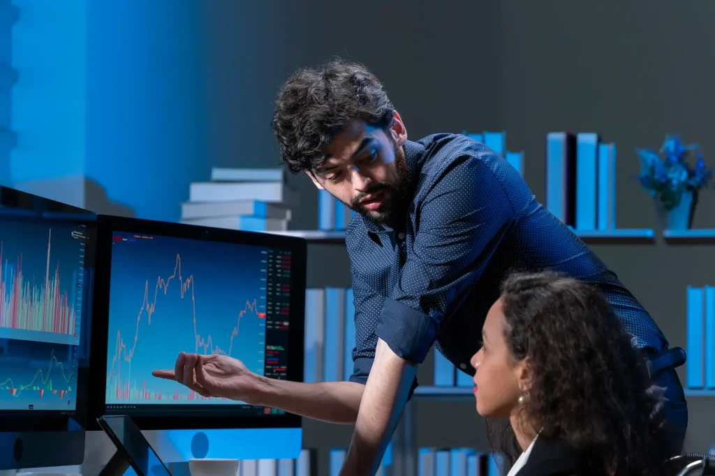 business professionals analyzing charts in modern 2026 01 08 08 05 28 utc